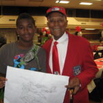 Student and George Reed at Asbury Park Middle School