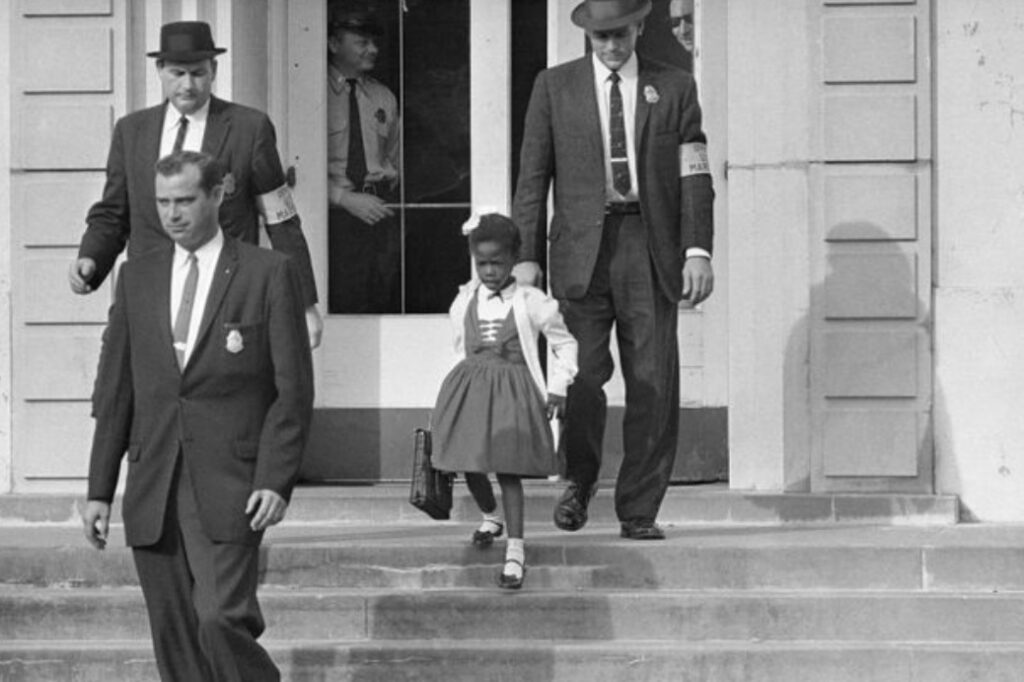 Iconic Ruby Bridges picture being walked by U.S. Marshals