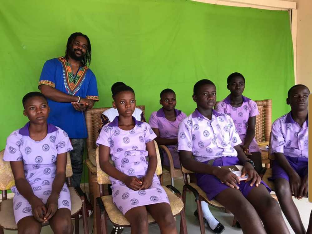 Papa Williams and students at Oiada International in Ghana