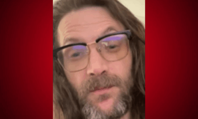 Christopher Robertson federal charges for racist threats