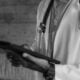 Find a black doctor lawsuit by white doctor